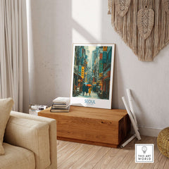 Seoul Poster South Korea - Vibrant City Life Art Print displayed in a stylish interior with wooden decor.