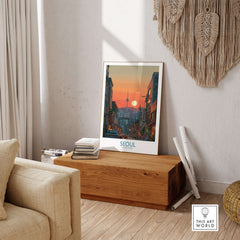 Seoul South Korea Wall Art - Korean Capital Travel Poster displayed in a cozy living room with sunset skyline.