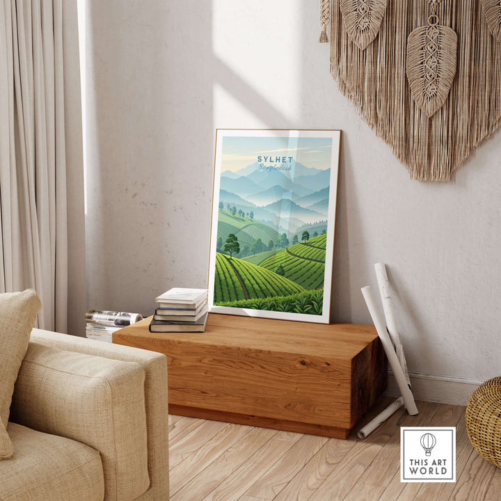 Sylhet wall art poster featuring lush tea estates and mountains, displayed in a cozy living room setting.