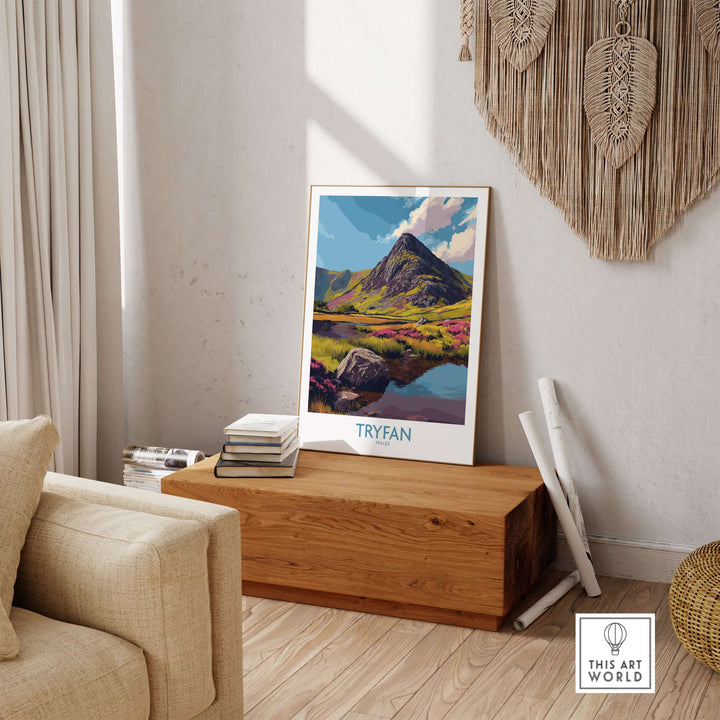 Tryfan poster featuring vibrant heather fields and rugged peaks, enhancing Welsh wilderness decor in a cozy living room.