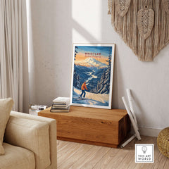 Whistler Travel Poster showcasing British Columbia's stunning ski landscapes in a cozy indoor setting.