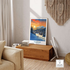 Whistler Wall Art Ski Poster displayed in a cozy living room setting, showcasing a stunning snow landscape.