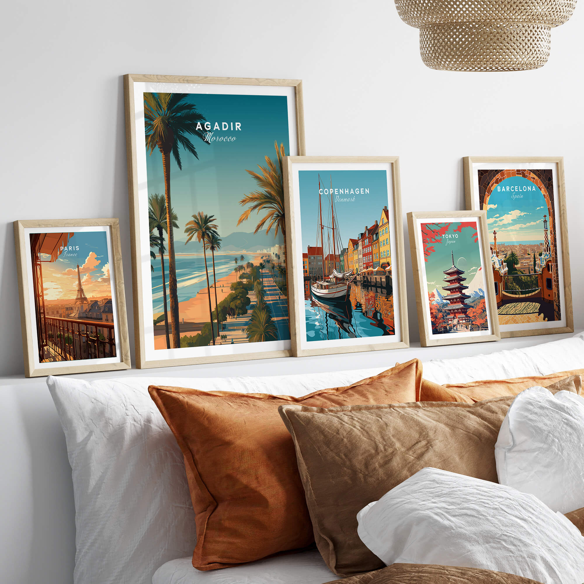 Agadir Travel Poster Print Morocco - Palm Trees displayed among other travel posters in a cozy setting.