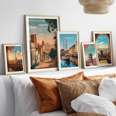 Asmara Travel Poster – Sunset Cityscape Art Print displayed in a chic living room setting with other travel posters.