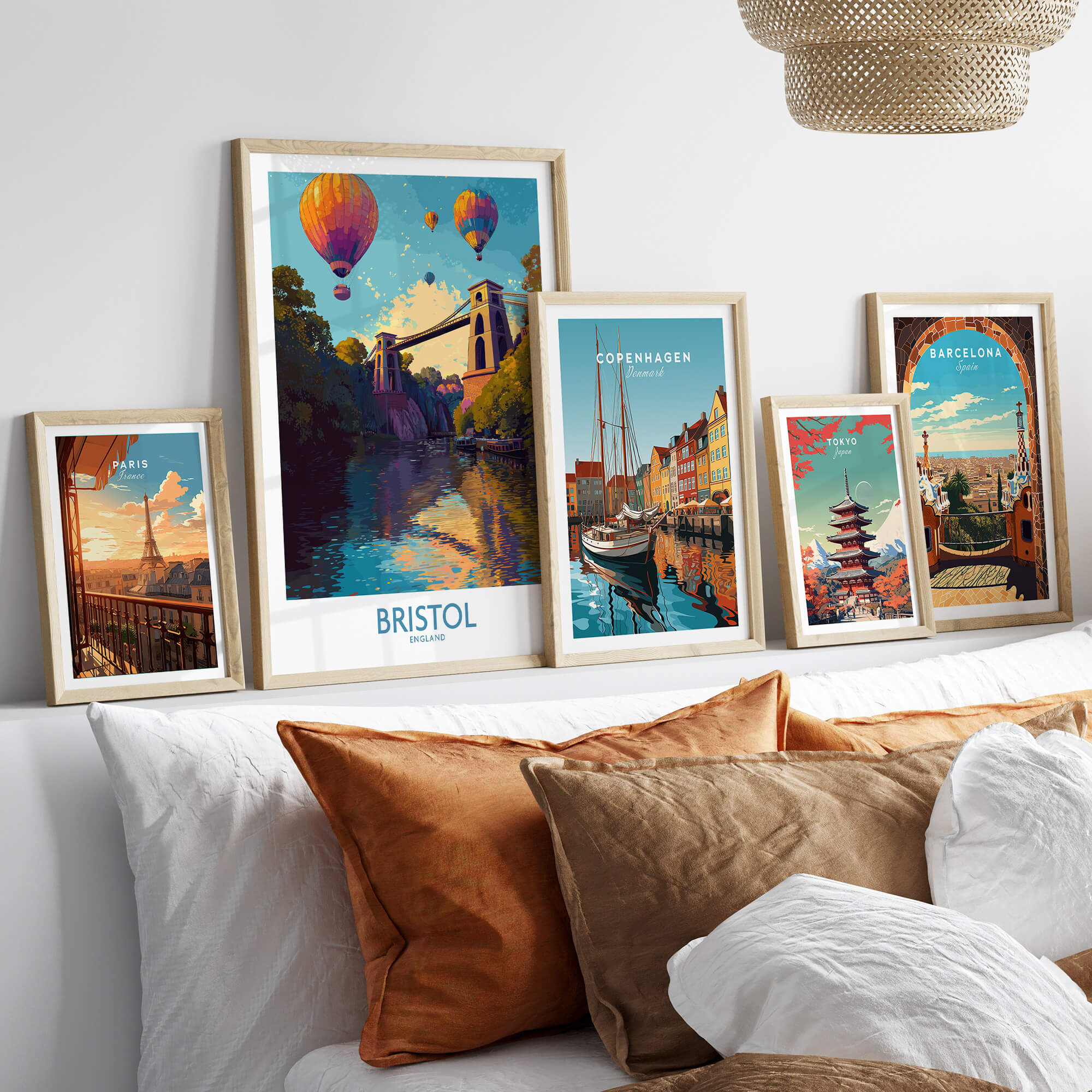 Bristol England Wall Art – River Avon Sunset and Balloon Festival Print displayed among other city art prints on a stylish shelf.
