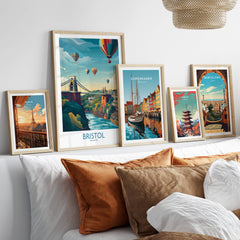 Bristol Canvas Print - Wall Art Poster displayed among framed cityscape art on a cozy couch with decorative pillows.