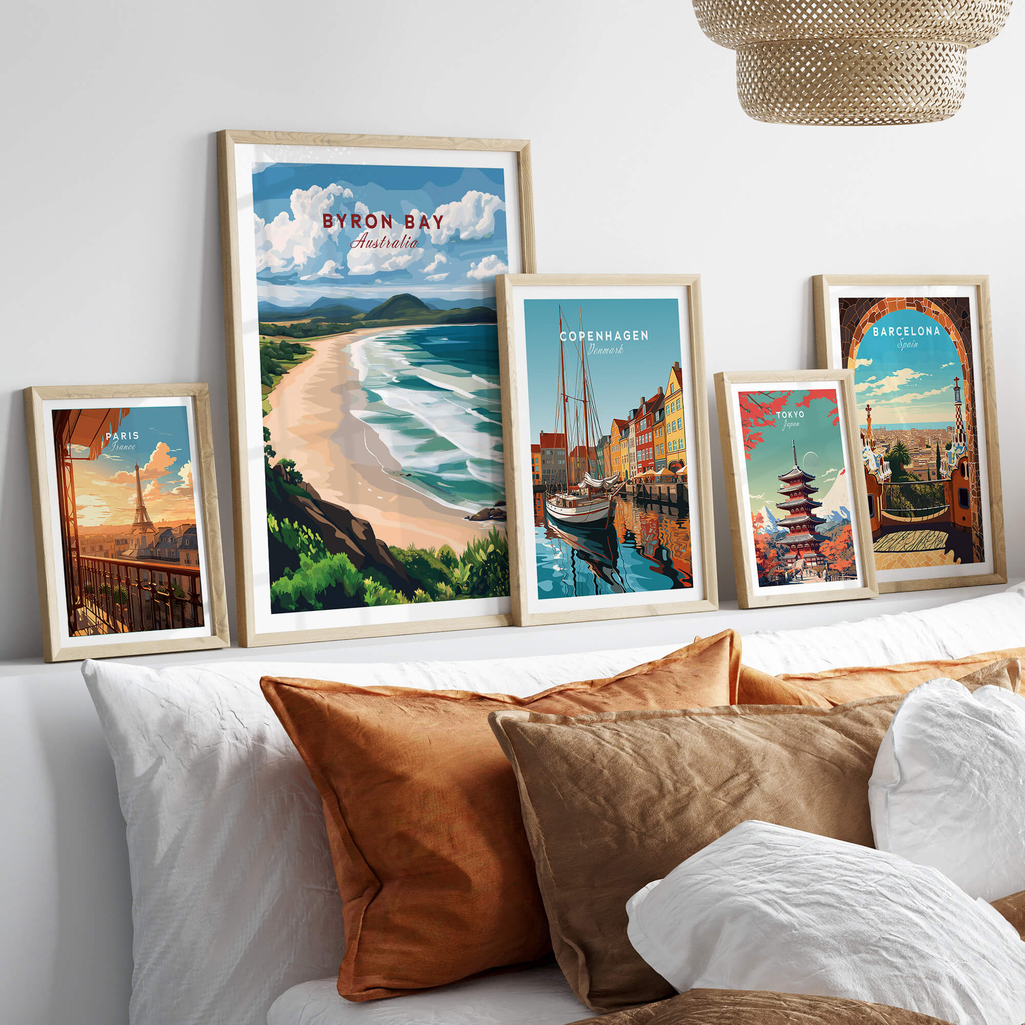 Byron Bay Beach Print - Australia Wall Art displayed in a stylish living room with cozy pillows and a modern decor.