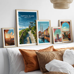 Captiva Island Poster – Florida Beach Print displayed among other travel posters on a stylish decor setup.