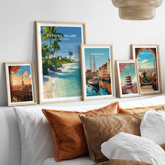 Captiva Island Travel Poster – White Sand Beach and Turquoise Water Art displayed among travel posters in a stylish living room.