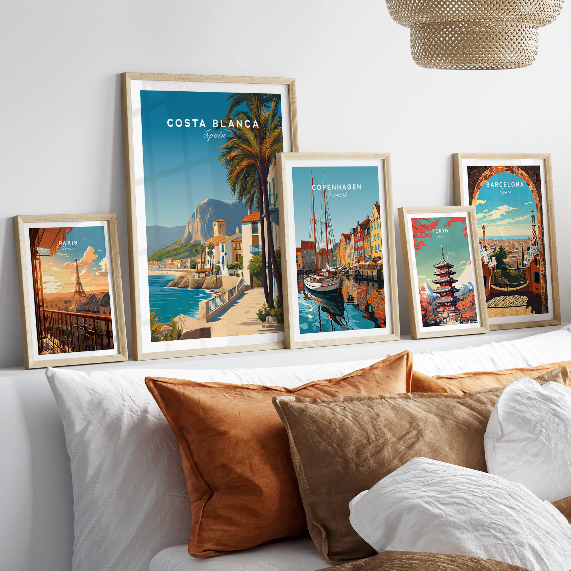 Costa Blanca Travel Poster - Spain Canvas Print displayed in framed art on a stylish sofa arrangement.
