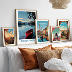 Derwentwater Cumbria Wall Art – Mountain Lake Landscape Print displayed among other artistic prints on a stylish sofa.