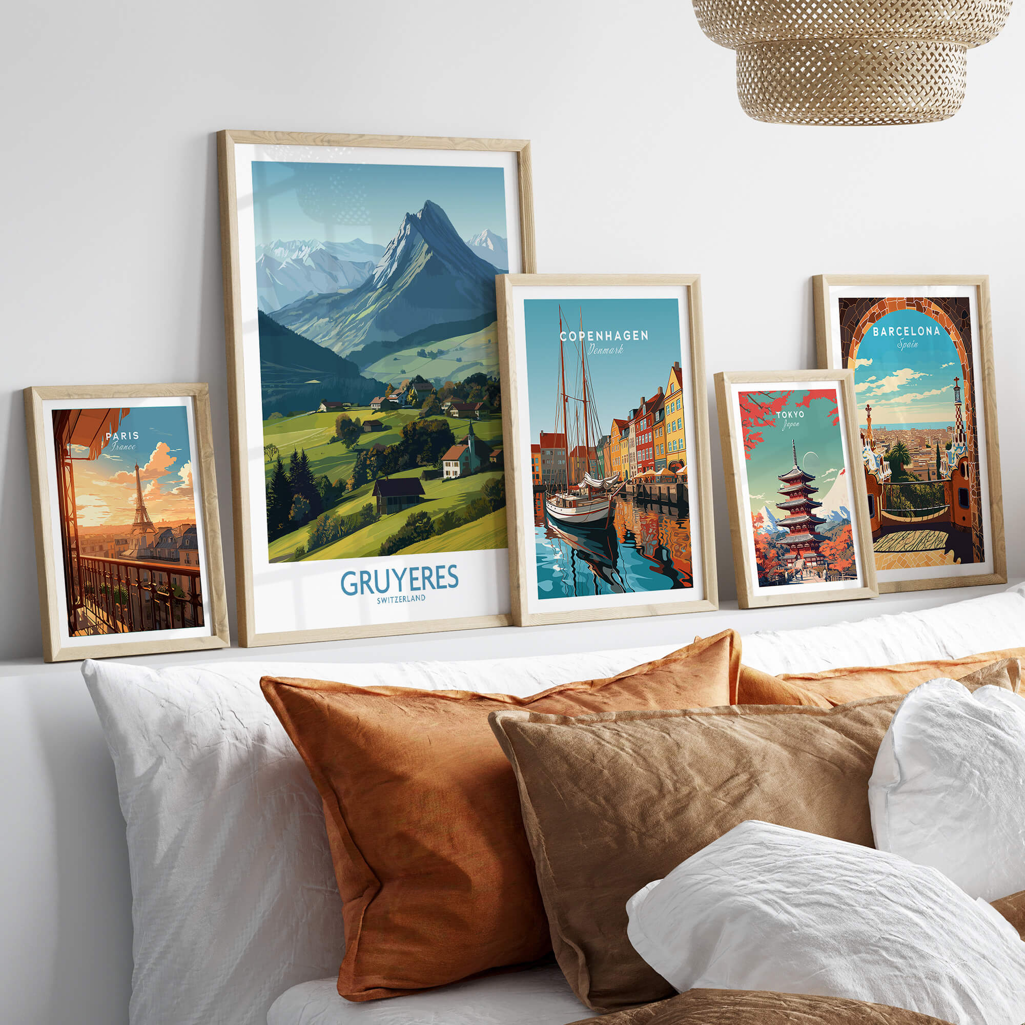 Gruyères Switzerland Canvas Print | Charming Swiss Countryside Scenery Poster displayed among other city posters on a couch.
