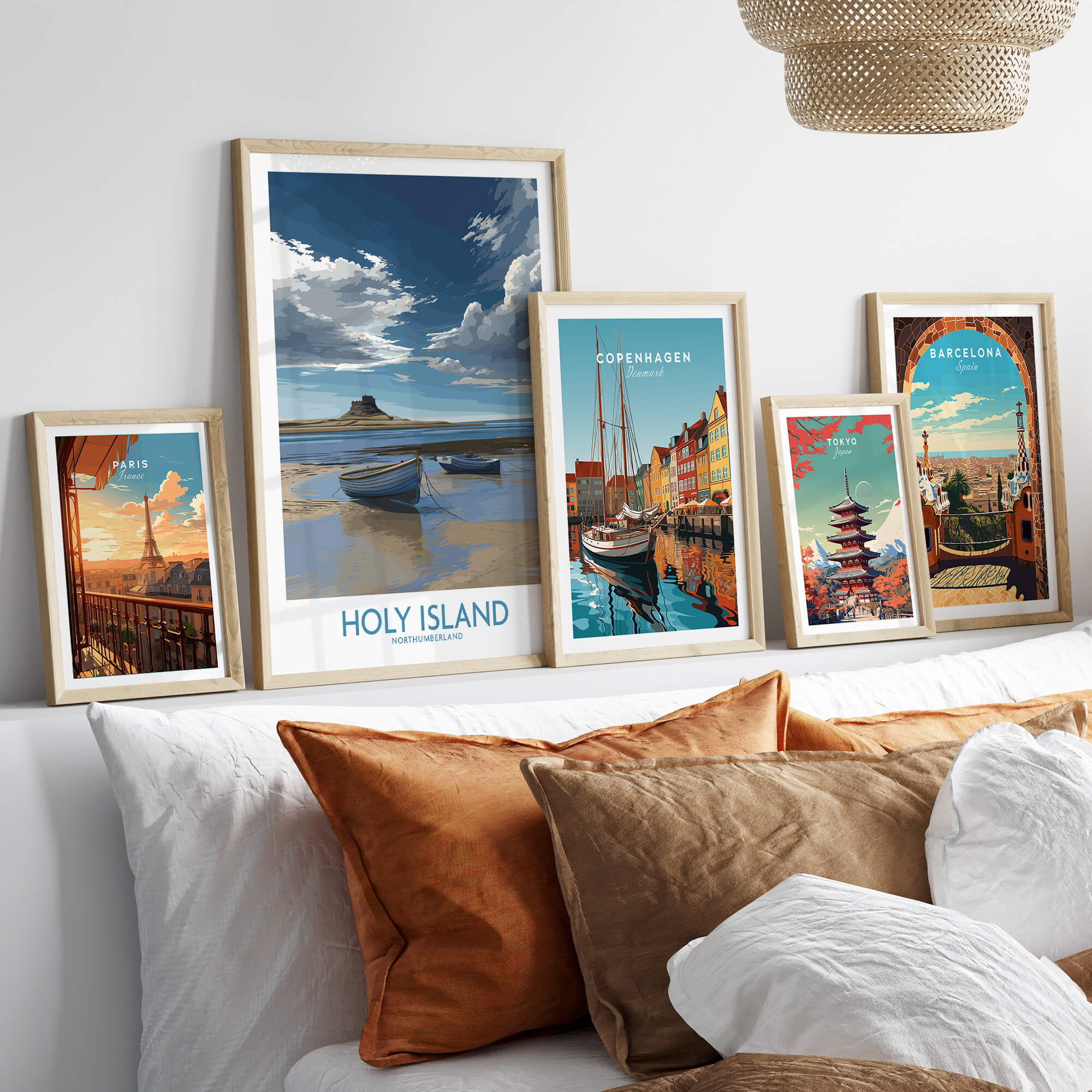 Holy Island Northumberland Poster | North Sea Coast Canvas Print displayed among framed art in a stylish living room setting.