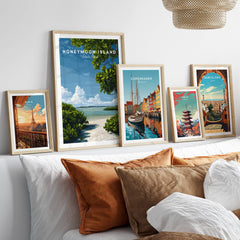 Honeymoon Island Florida Travel Poster | Mangrove Coast Wall Art Print displayed with other travel posters on a cozy couch.