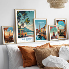 Honolulu Hawaii Poster | Vintage Aloha Style Canvas Print displayed among other vintage travel posters on a couch.