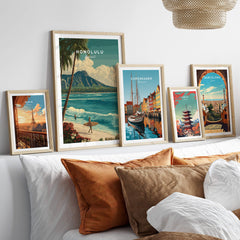 Honolulu Hawaii Wall Art Print | Waikiki Beach Surf Travel Poster displayed among travel art prints on a stylish sofa.