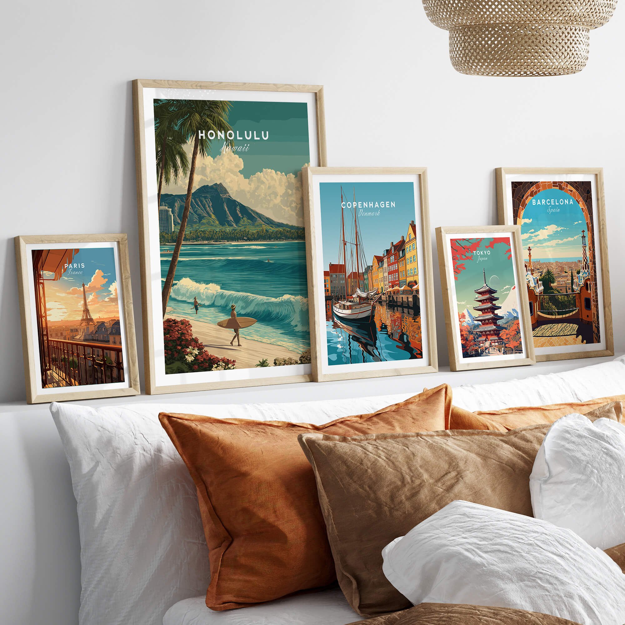 Honolulu Hawaii Wall Art Print | Waikiki Beach Surf Travel Poster displayed among travel art prints on a stylish sofa.