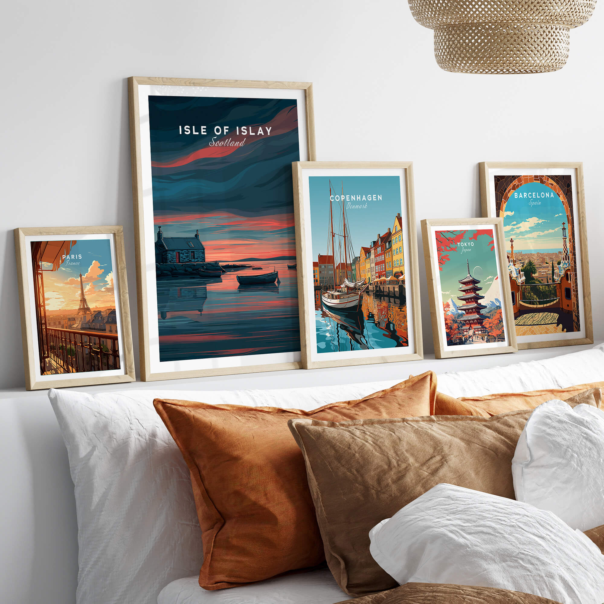 Isle of Islay Scotland Travel Posters | Highland Coastal House Wall Art Print displayed in stylish frames on a cozy bed.