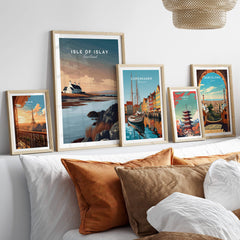 Isle of Islay Scotland Travel Posters | Scenic Coastal Cottage Wall Art Print displayed among other travel posters.