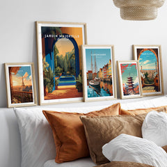 Jardim Majorelle Marrakesh Travel Posters | Garden Fountain Scene Wall Art Print displayed on a stylish sofa.