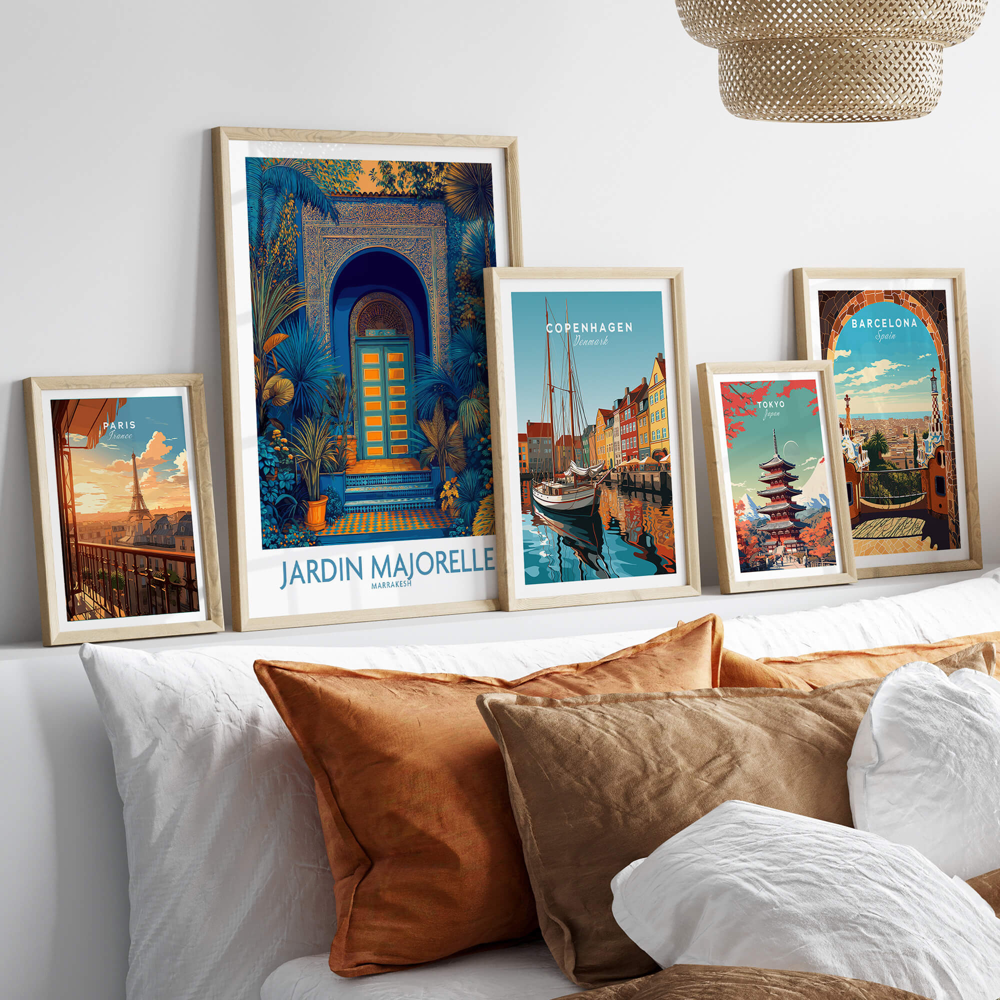 Jardim Majorelle Marrakesh Posters | Detailed Blue Architecture Canvas Print displayed among other city posters on a sofa.