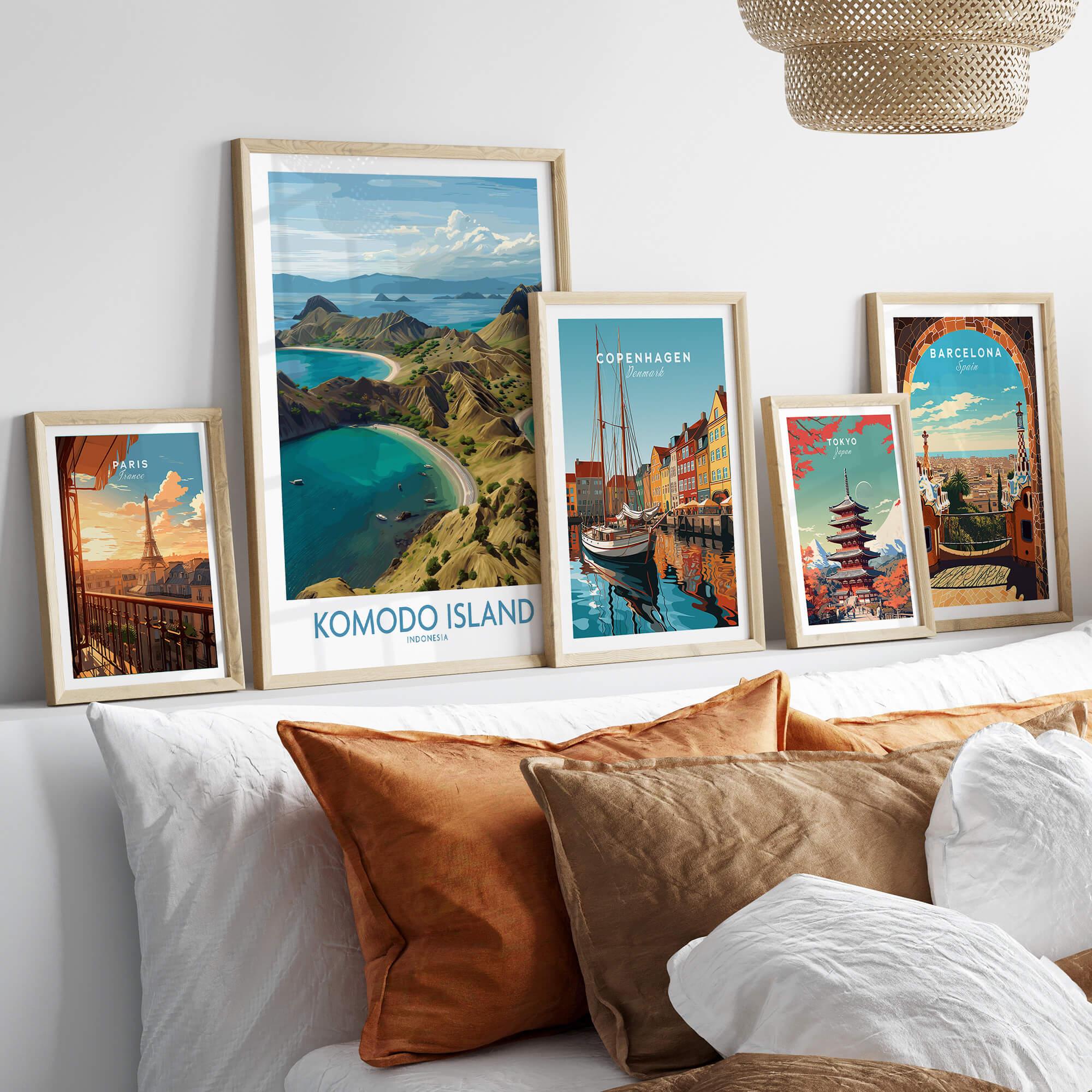Framed travel posters of Komodo Island, Paris, Copenhagen, Tokyo, and Barcelona above a bed.