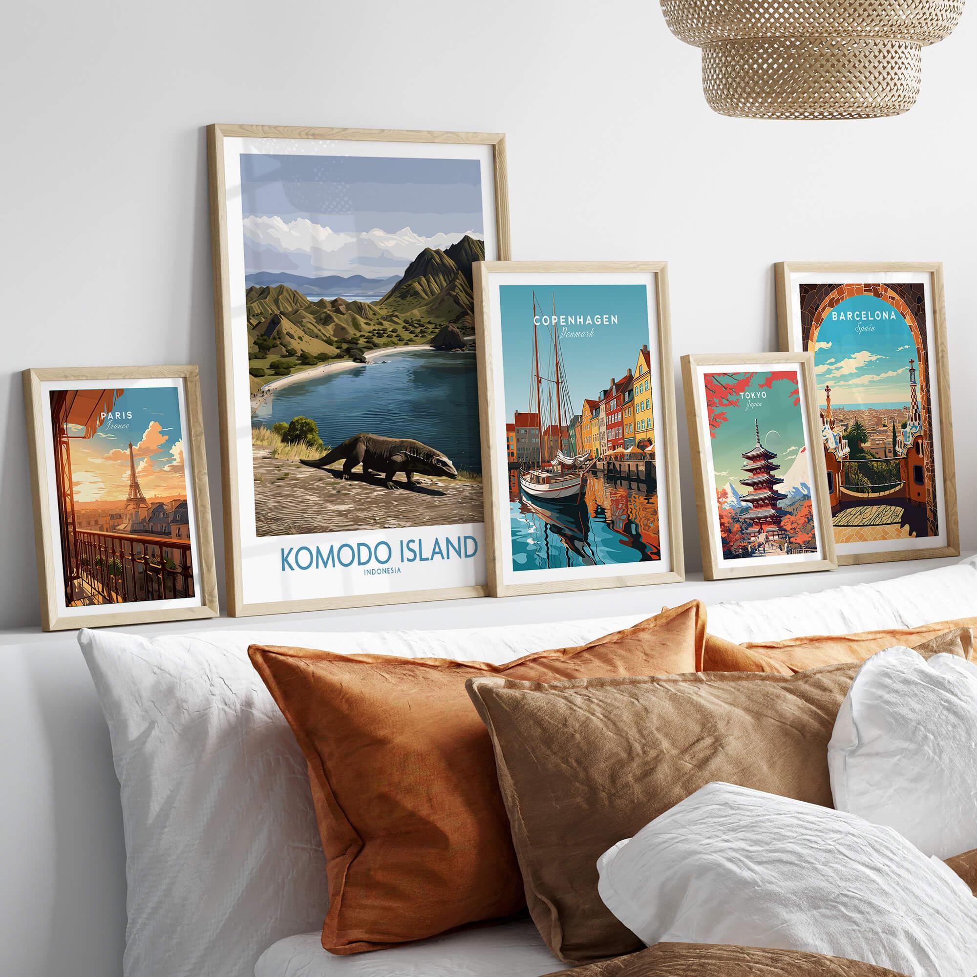 Framed travel posters for Komodo Island, Paris, Copenhagen, Tokyo, and Barcelona above a bed