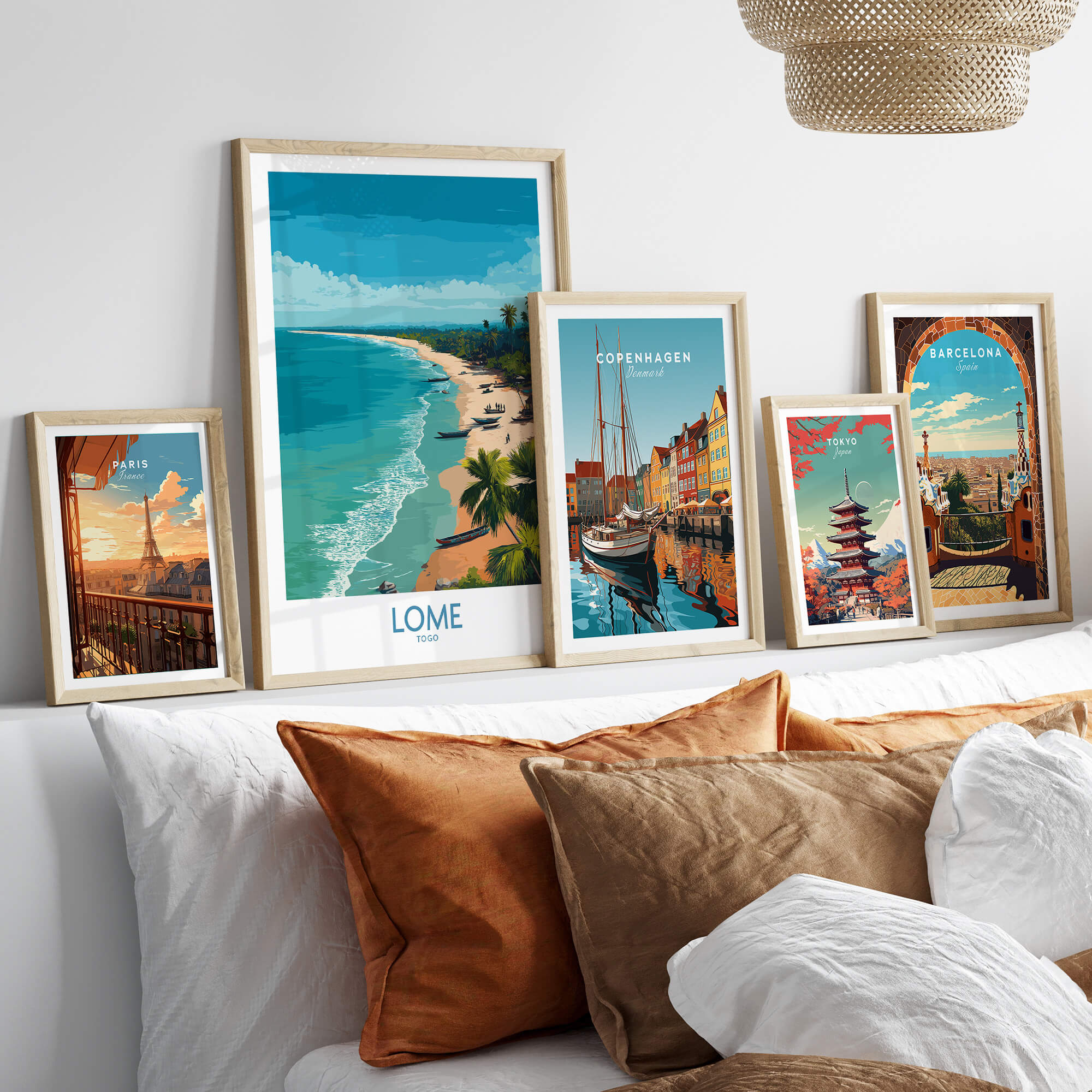 Lomé Togo Poster | West African Coastline Canvas Print displayed among other travel posters on a sofa.