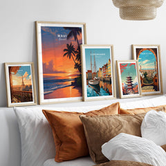 Maui Hawaii Wall Art Print | Tropical Beach Sunset Travel Poster displayed among other travel posters in a stylish living room.