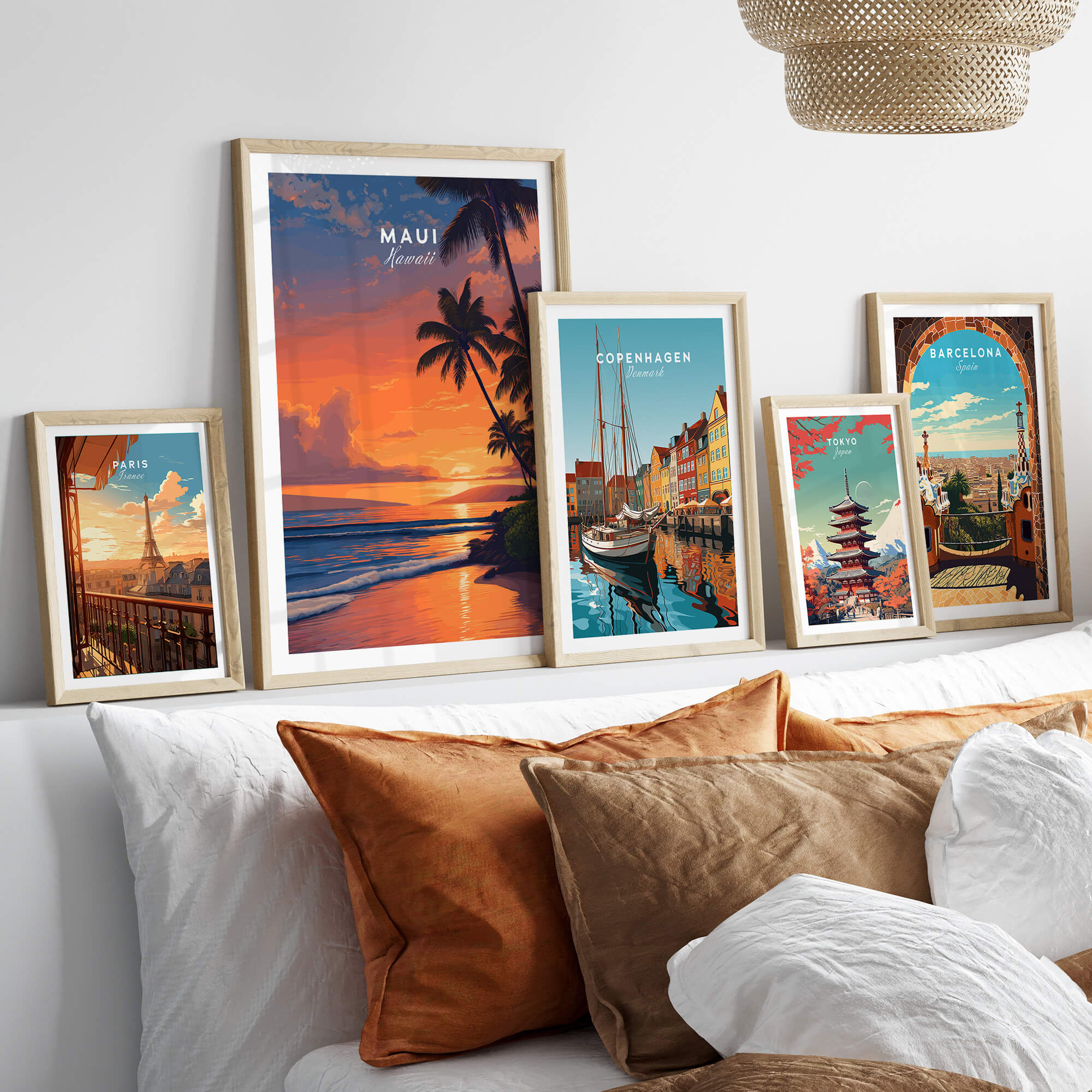 Maui Hawaii Wall Art Print | Tropical Beach Sunset Travel Poster displayed among other travel posters in a stylish living room.