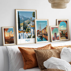 Mijas Spain Poster | Scenic Mountain Town Landscape Canvas Print displayed alongside other travel posters in a stylish interior setting.