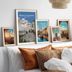 Mount Rushmore Print | National Memorial Wall Art displayed among other framed travel posters on a stylish living room wall.