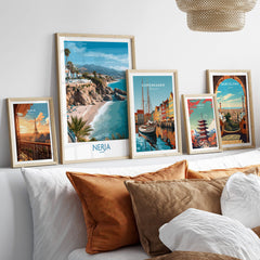 Nerja Spain Poster | Mediterranean Beach Landscape Canvas Print displayed on a stylish wall with various city-themed prints.