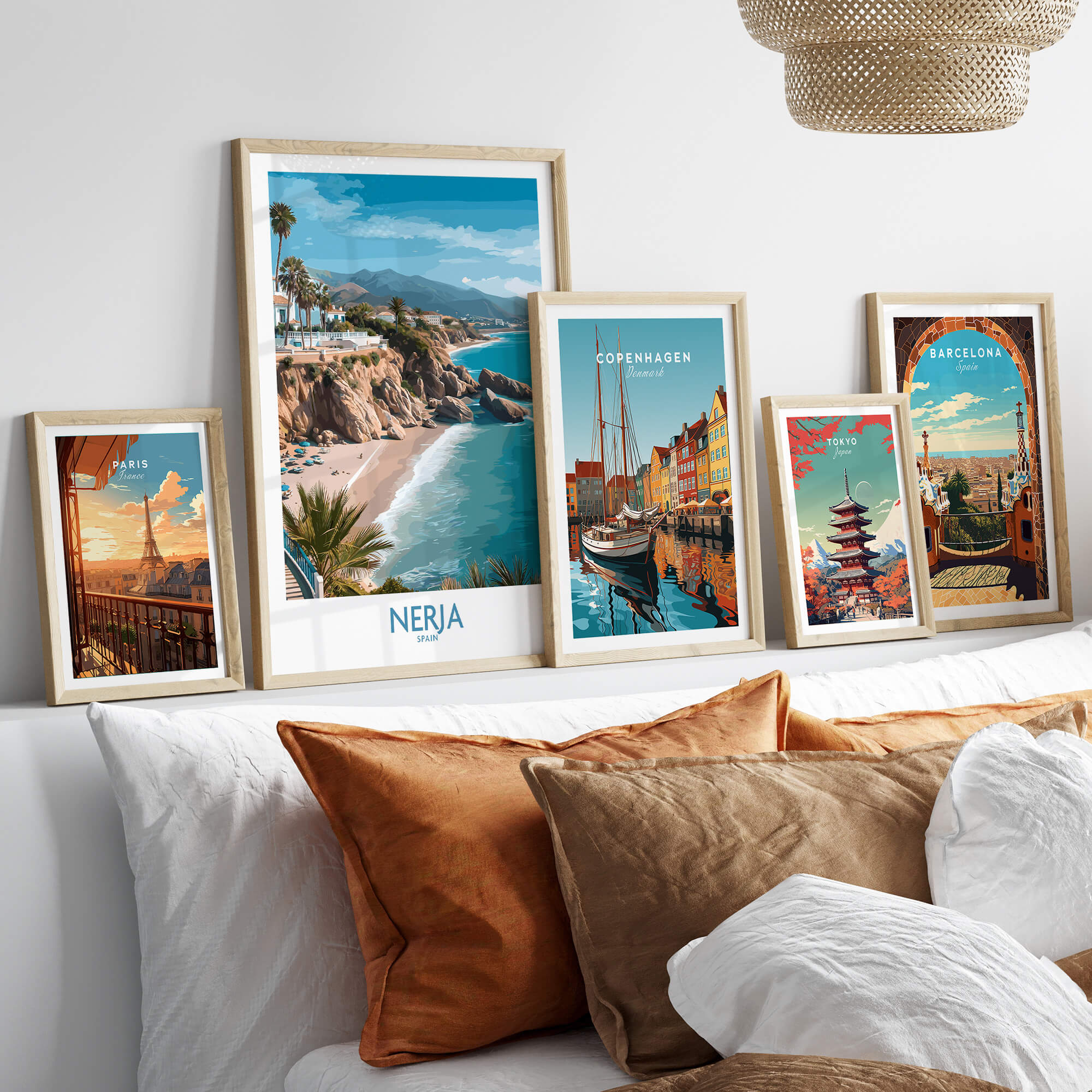 Nerja Spain Poster | Mediterranean Beach Landscape Canvas Print displayed on a stylish wall with various city-themed prints.