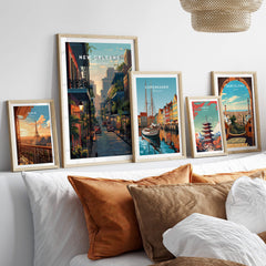 New Orleans Wall Art Print | Historic French Quarter Travel Poster displayed with other city prints on a cozy sofa.