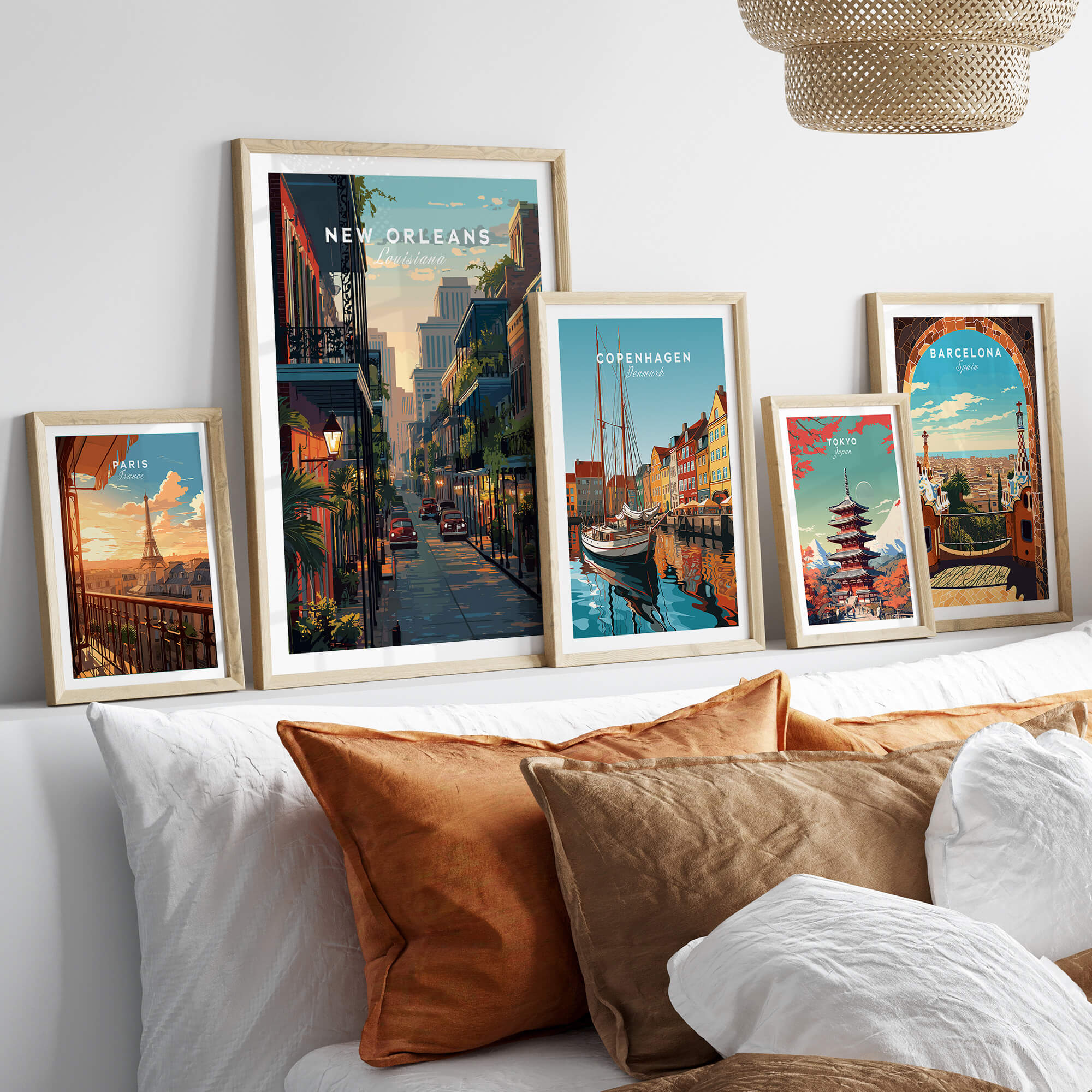 New Orleans Wall Art Print | Historic French Quarter Travel Poster displayed with other city prints on a cozy sofa.
