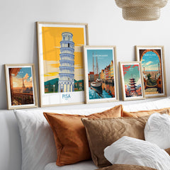 Pisa Tower Italy Print displayed among other city prints on a stylish bed decor.