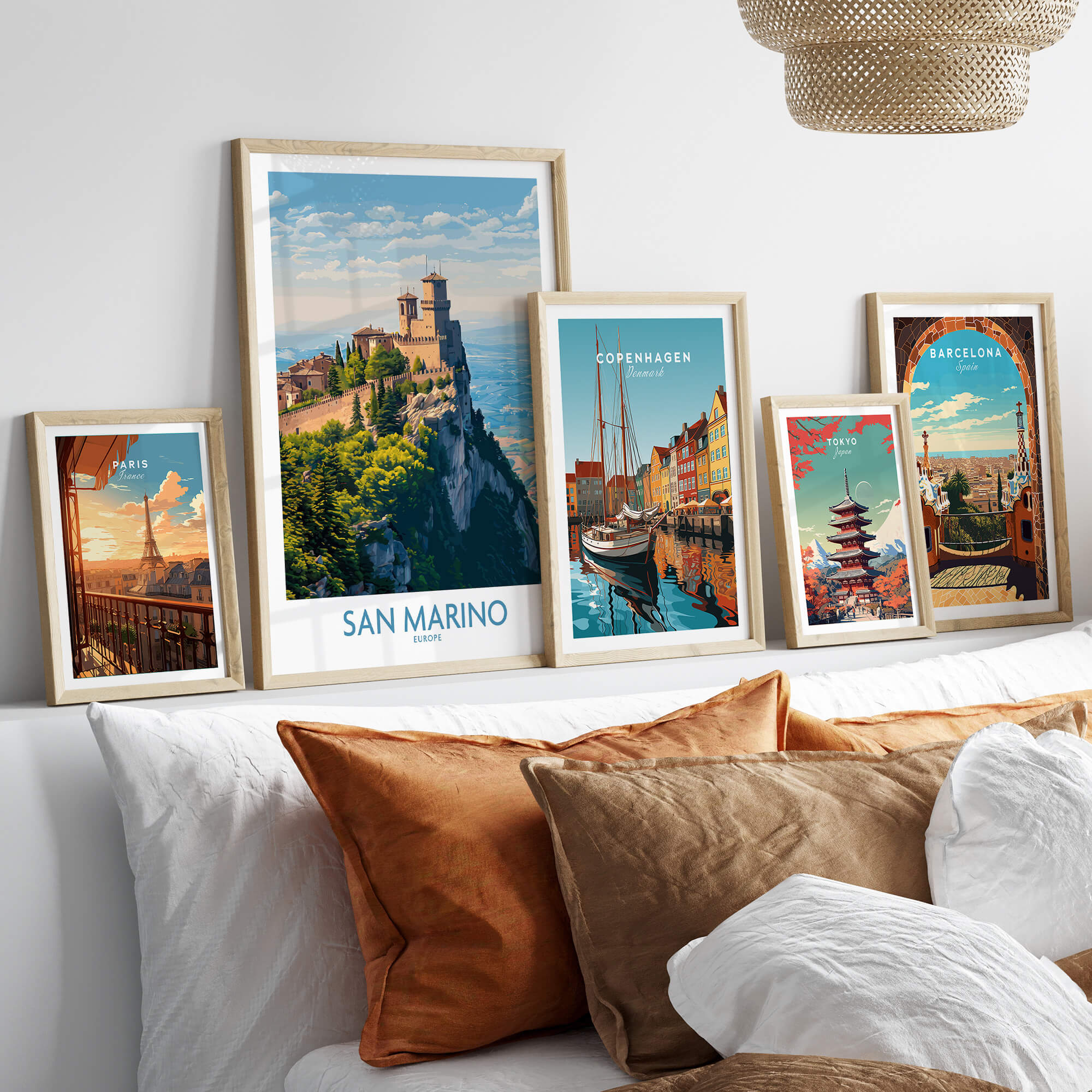 San Marino Poster | Canvas Print displayed with other city posters on a stylish couch.