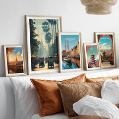 Siem Reap Cambodia Travel Poster | Tropical Town Street Wall Art Print collection framed on a stylish couch with decorative pillows.