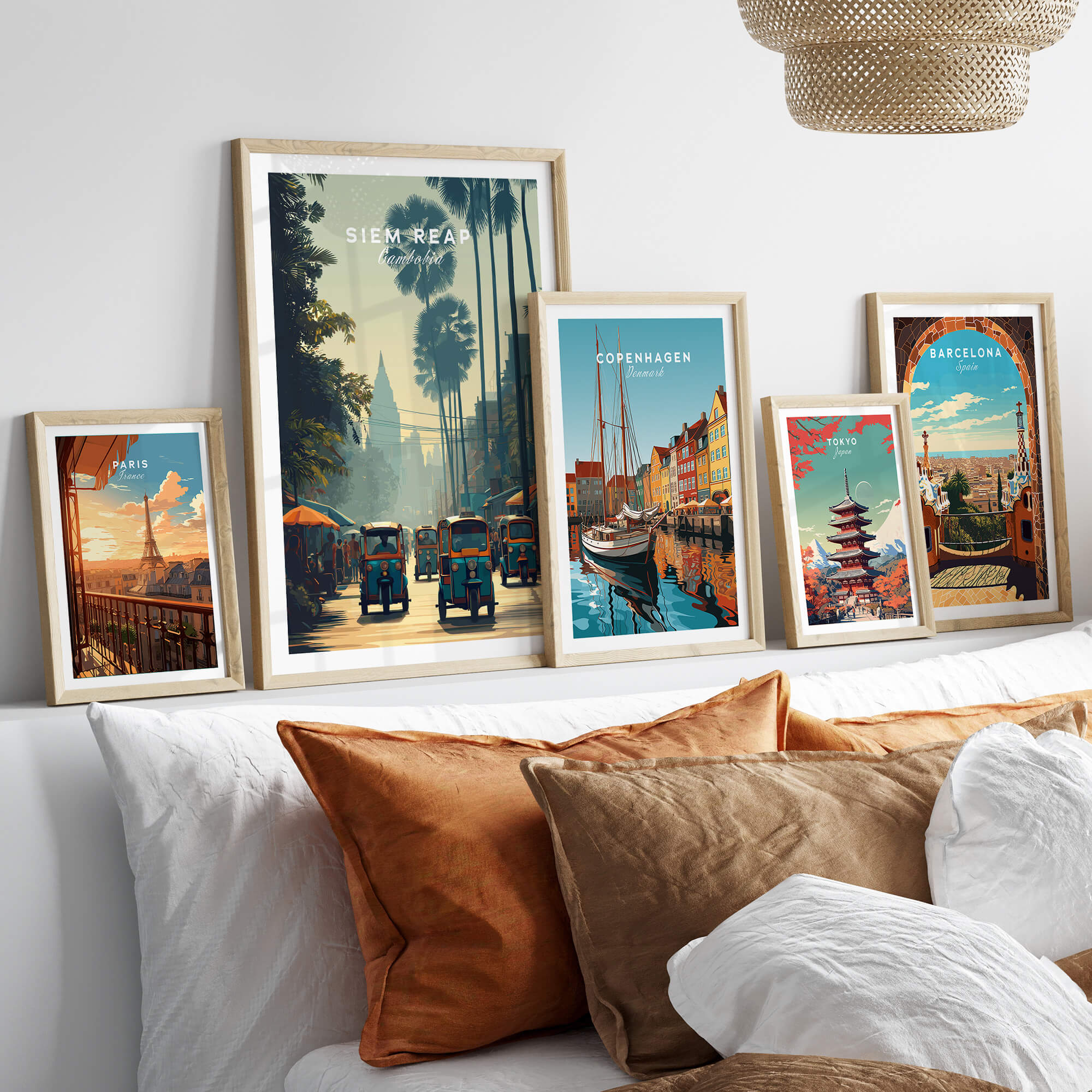 Siem Reap Cambodia Travel Poster | Tropical Town Street Wall Art Print collection framed on a stylish couch with decorative pillows.
