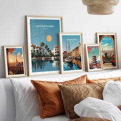 Sotogrande Spain Travel Poster | Luxury Marina & Boats Wall Art Print displayed on a stylish sofa with cushions.
