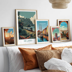 Sri Lanka Poster | Tropical Railway Canvas Print displayed in frames on a sofa with decorative cushions.