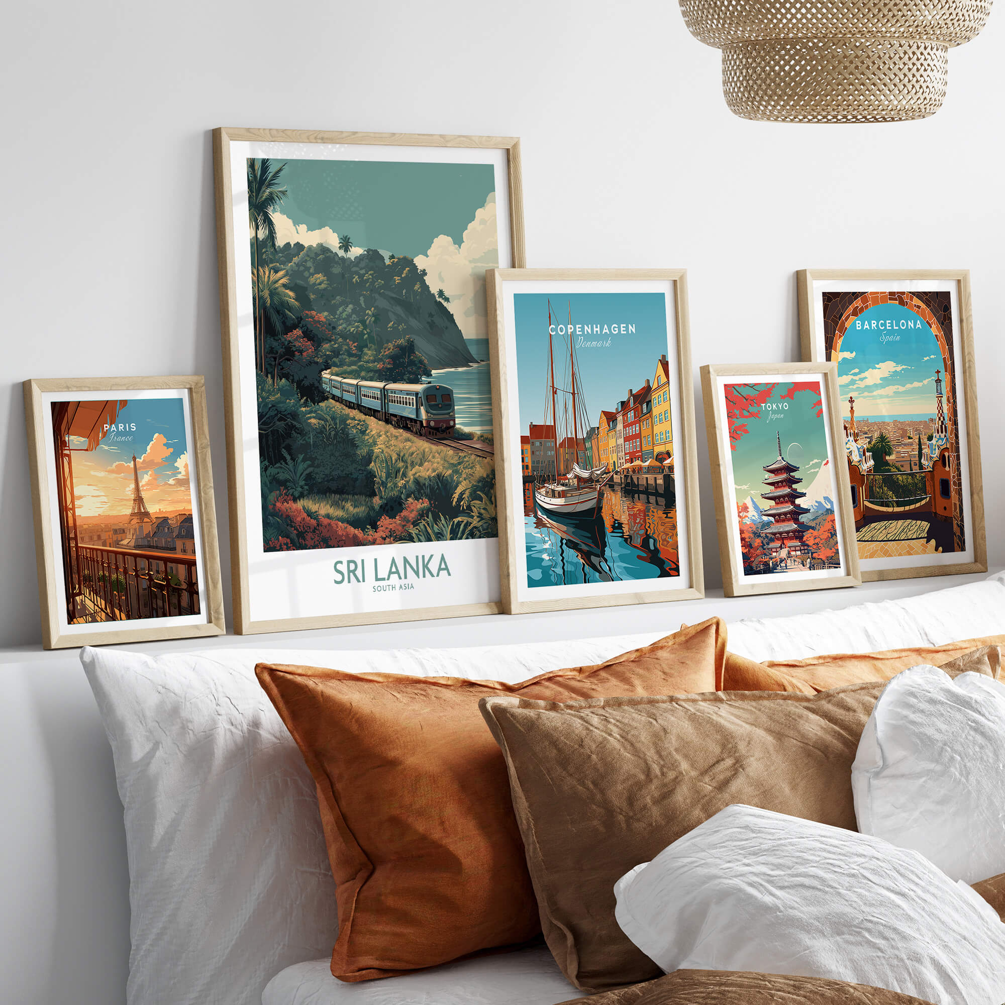 Sri Lanka Poster | Tropical Railway Canvas Print displayed in frames on a sofa with decorative cushions.