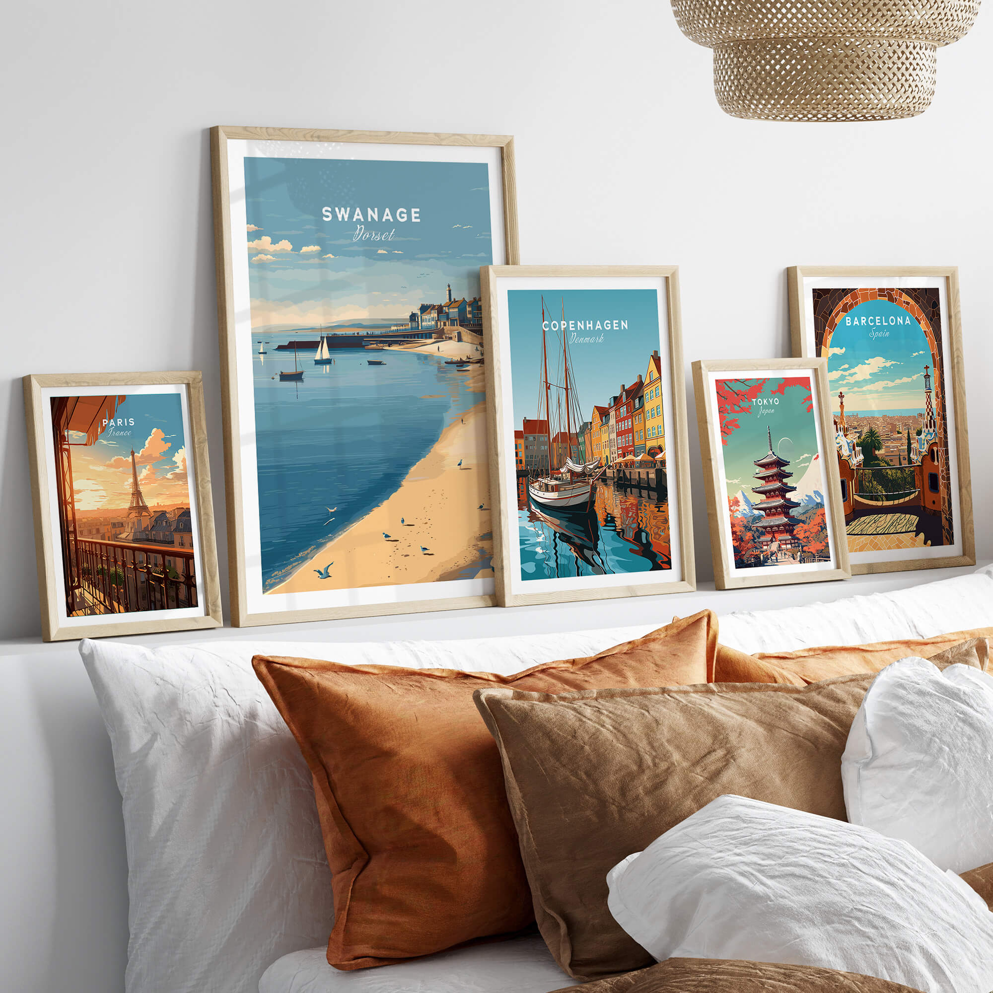 Swanage Dorset Travel Poster | English Coastal Town Wall Art Print framed on wall with other travel posters.
