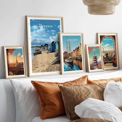 Abersoch Welsh Seaside Village Scene Print | Llyn Peninsula Home Art displayed in stylish frames on a cozy sofa.