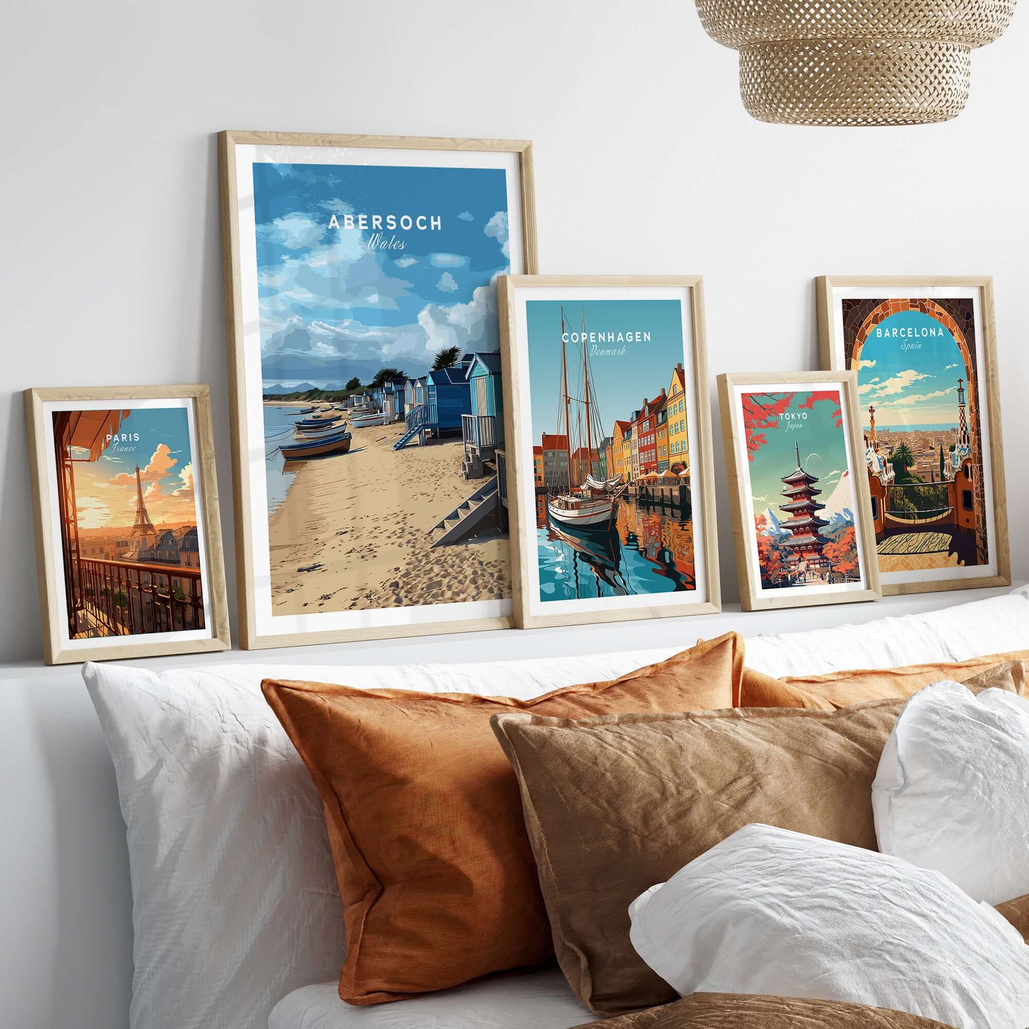 Abersoch Welsh Seaside Village Scene Print | Llyn Peninsula Home Art displayed in stylish frames on a cozy sofa.