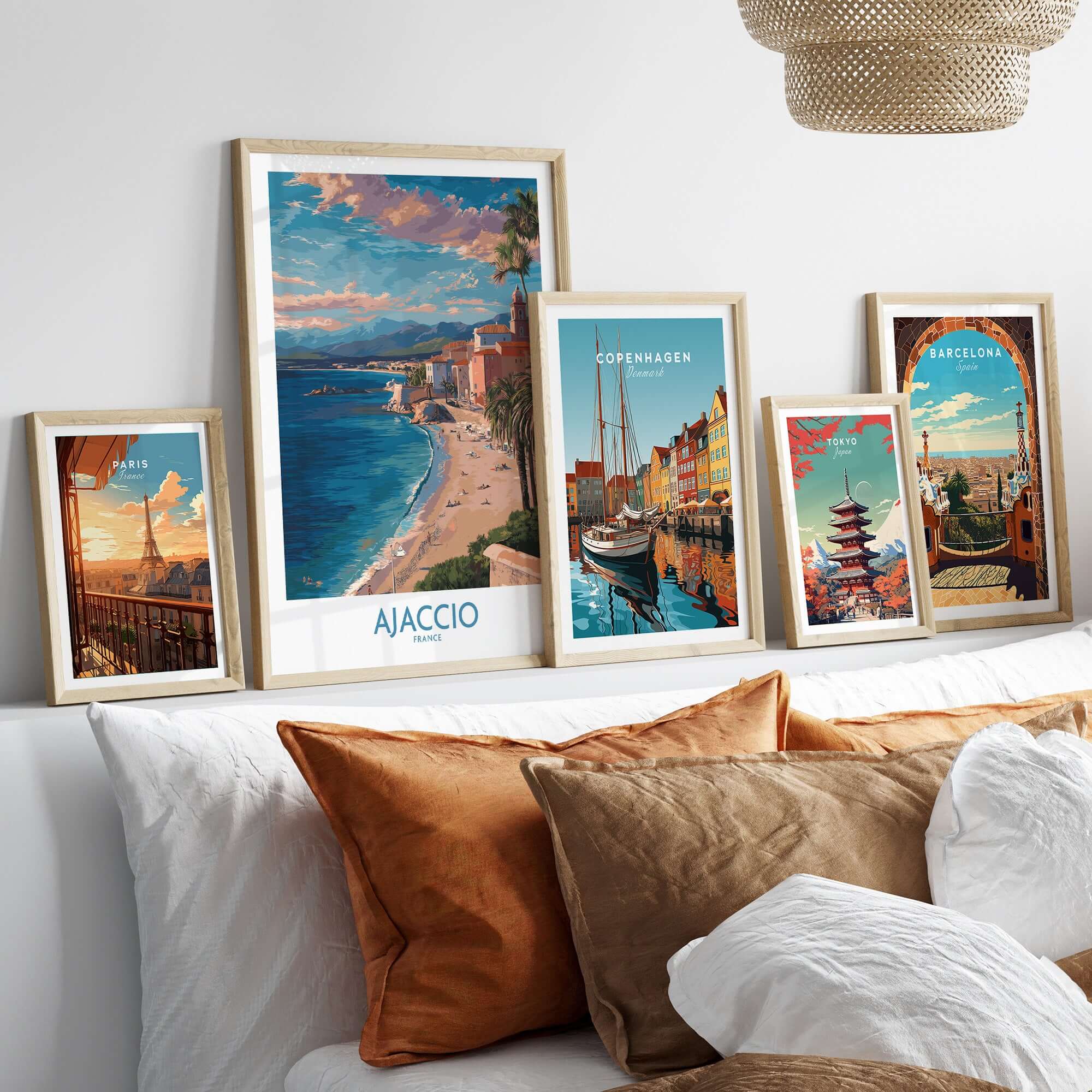 Ajaccio France Coastal Beach Art Print | Corsica Sunset City Poster displayed among other city art prints on a stylish sofa.