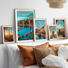 Antalya Canvas Print | Turkish Beach Wall Art displayed with other city posters on a cozy couch.