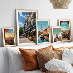 Harrogate Street View Print | Yorkshire Home Decor displayed among other city prints on a cozy couch.