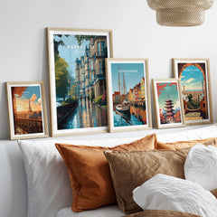 Harrogate Classic British Town Scene Print | English Architecture Wall Art displayed in stylish frames on a cozy sofa.
